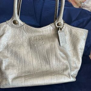 Coach platinum, leather, gold-tone, midsize purse.